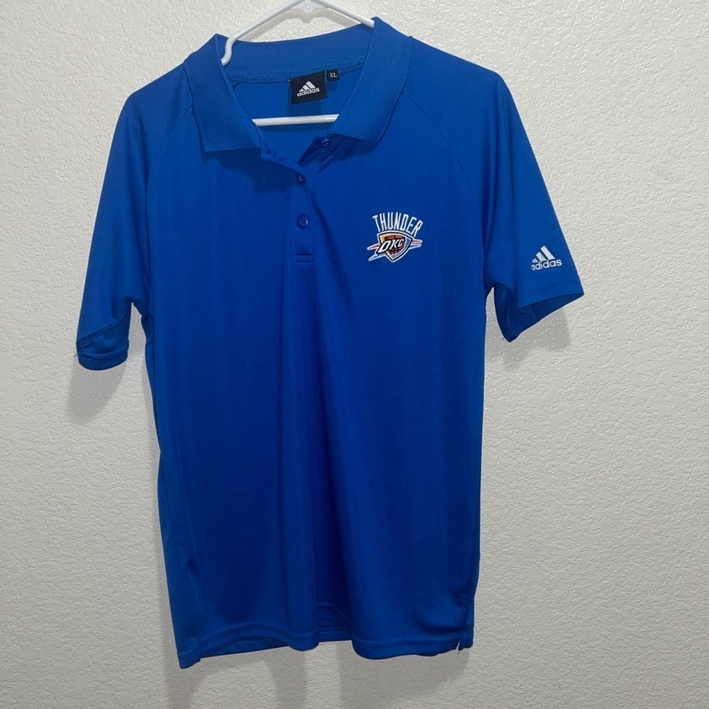 NWOT Royal Blue Thunder Polo never worn!